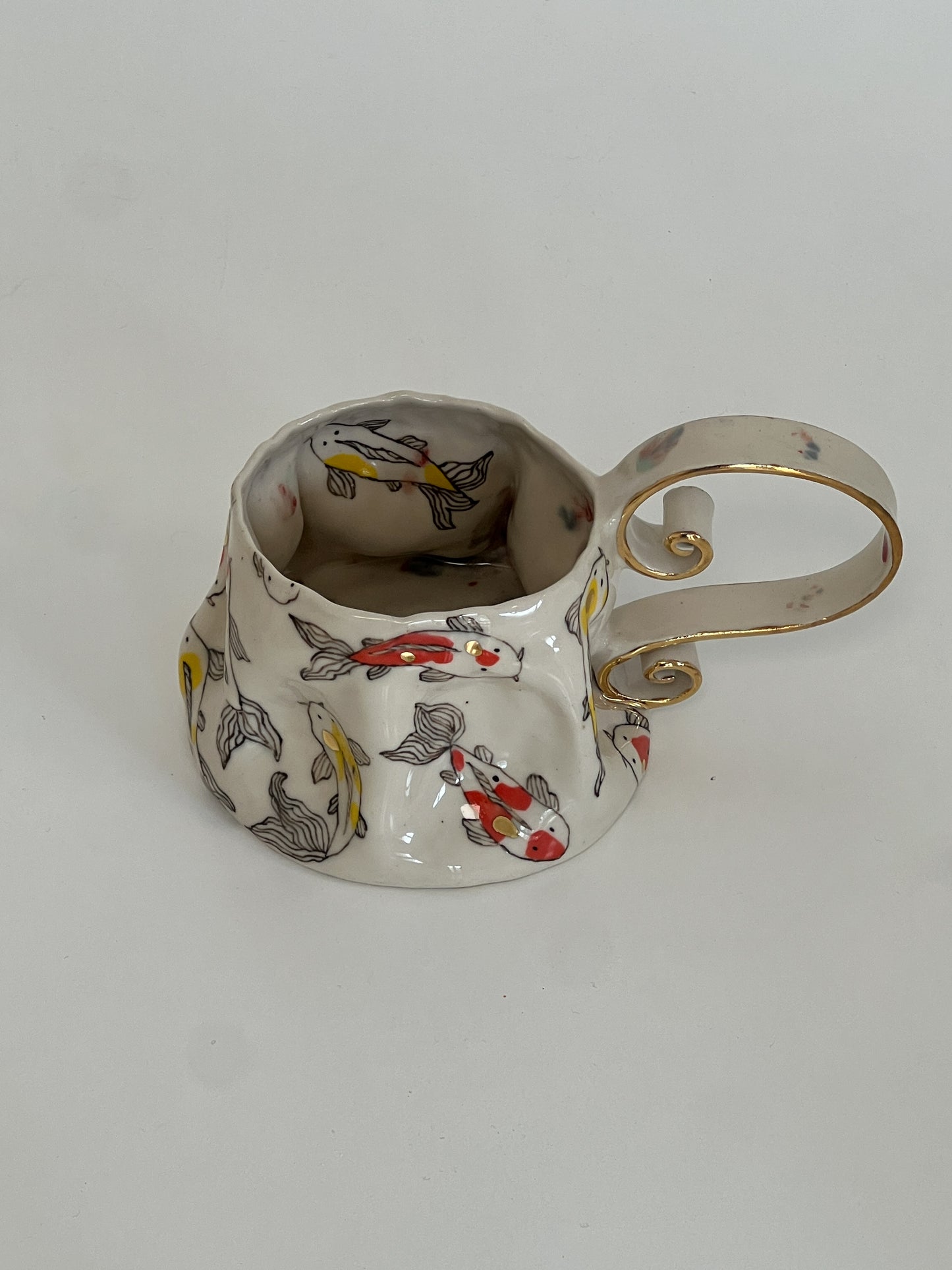 crumpled dancing koi mug