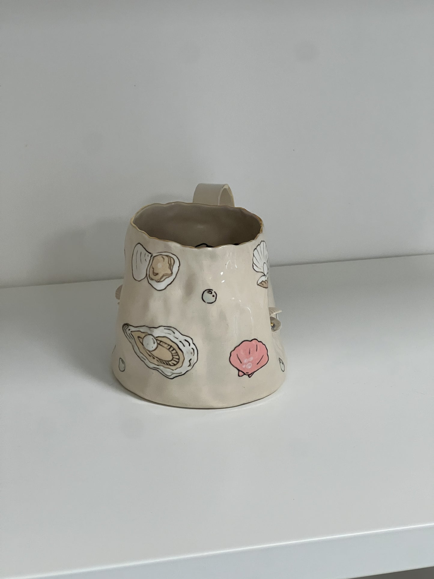 ''collecting sea shells'' mug